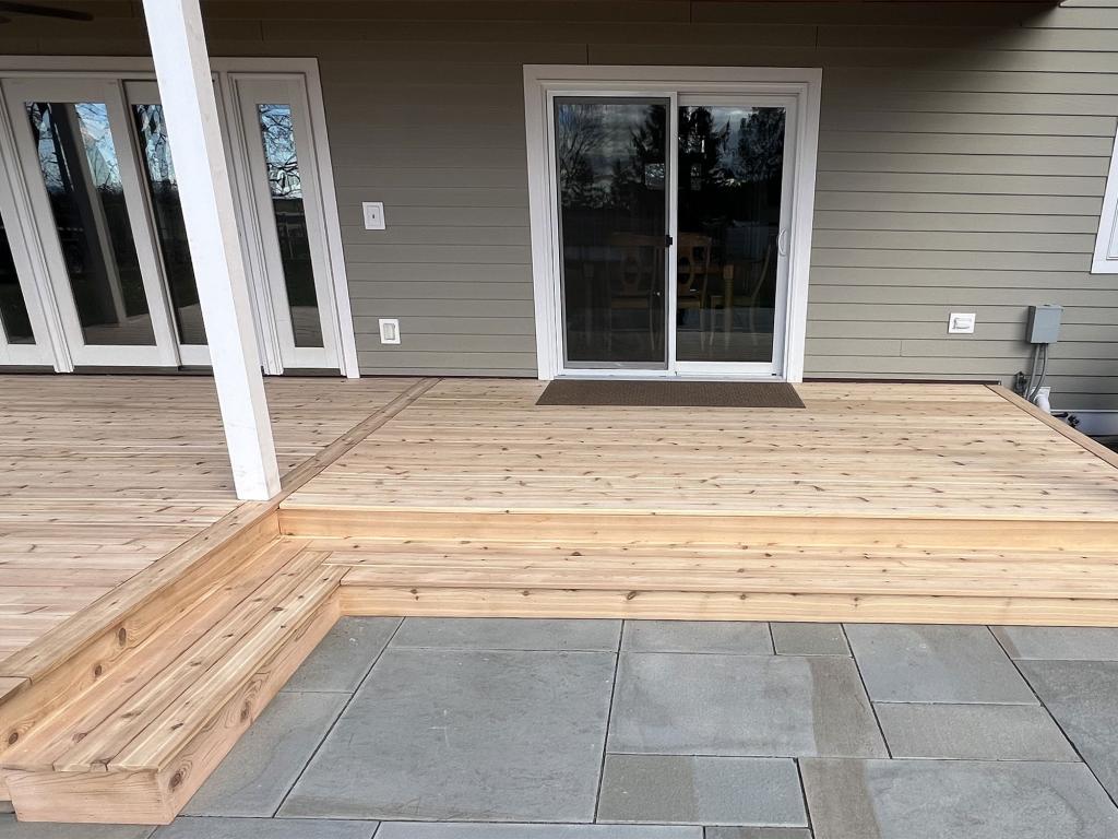 Completed porch and deck construction project by WS Carpentry