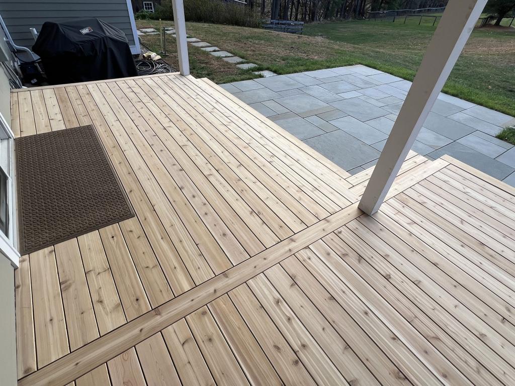 Completed porch and deck construction project by WS Carpentry